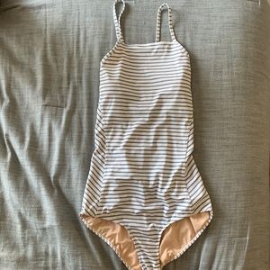NWOT Albion Fit one piece. Light blue and white stripe. Medium. Wonderful fit!